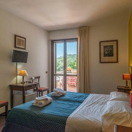 Hotel Le Rocce Magione Buitenkant foto