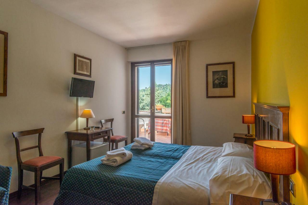 Hotel Le Rocce Magione Buitenkant foto